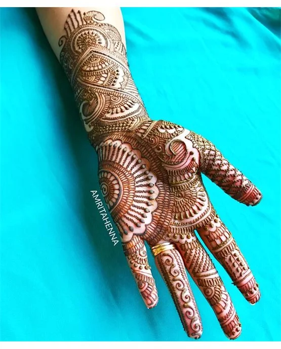 Heavy Motif With Outline Featuring Front Full Hand Mehndi Design